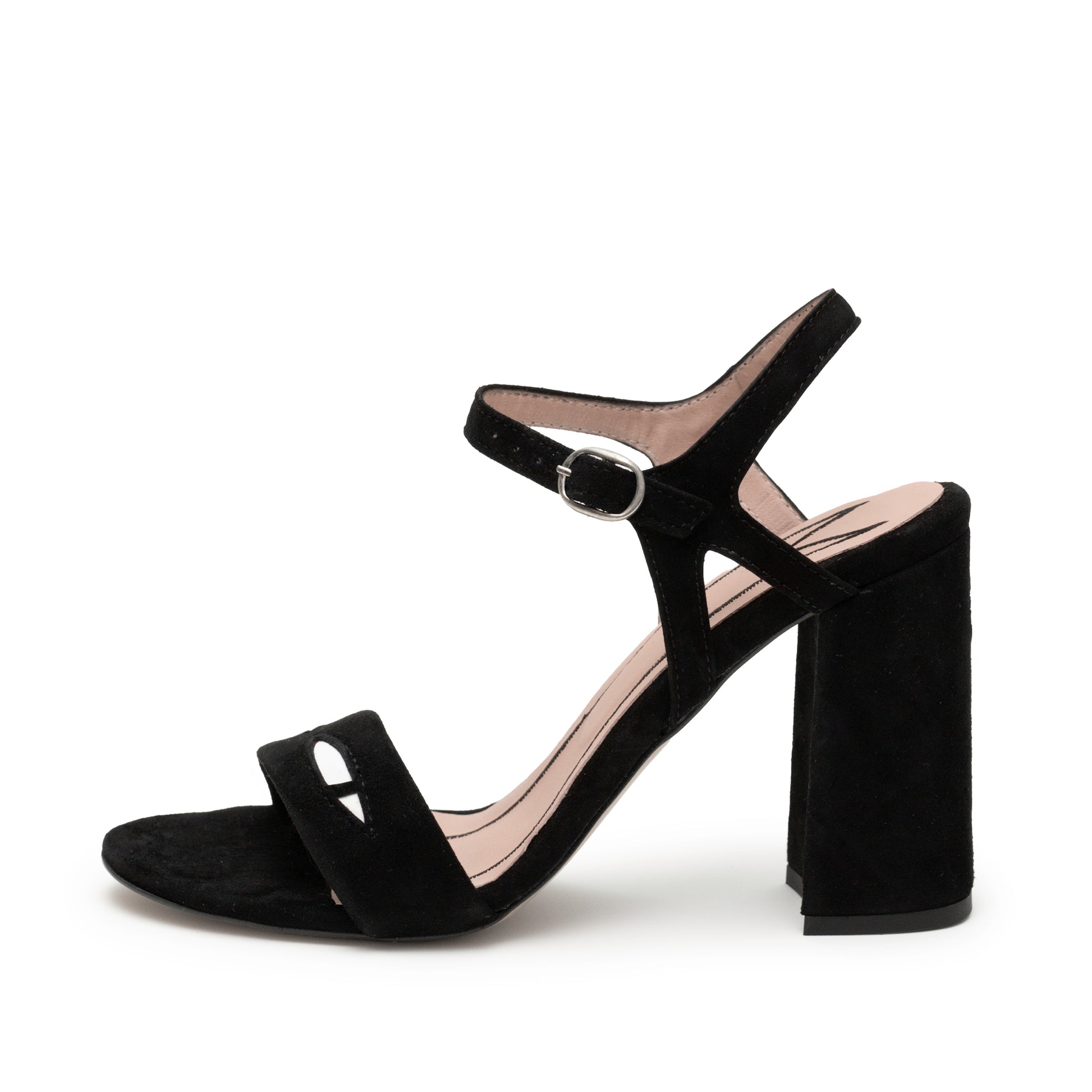 An elegant handmade high heeled black suede sandal with cat eyes on the toe strap and a silver clasp on the ankle strap.