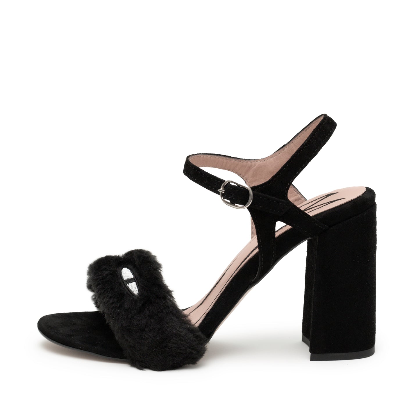 High heeled black strappy sandal with cat eyes on a fluffy faux fur strap and black suede ankle straps with a silver clasp.